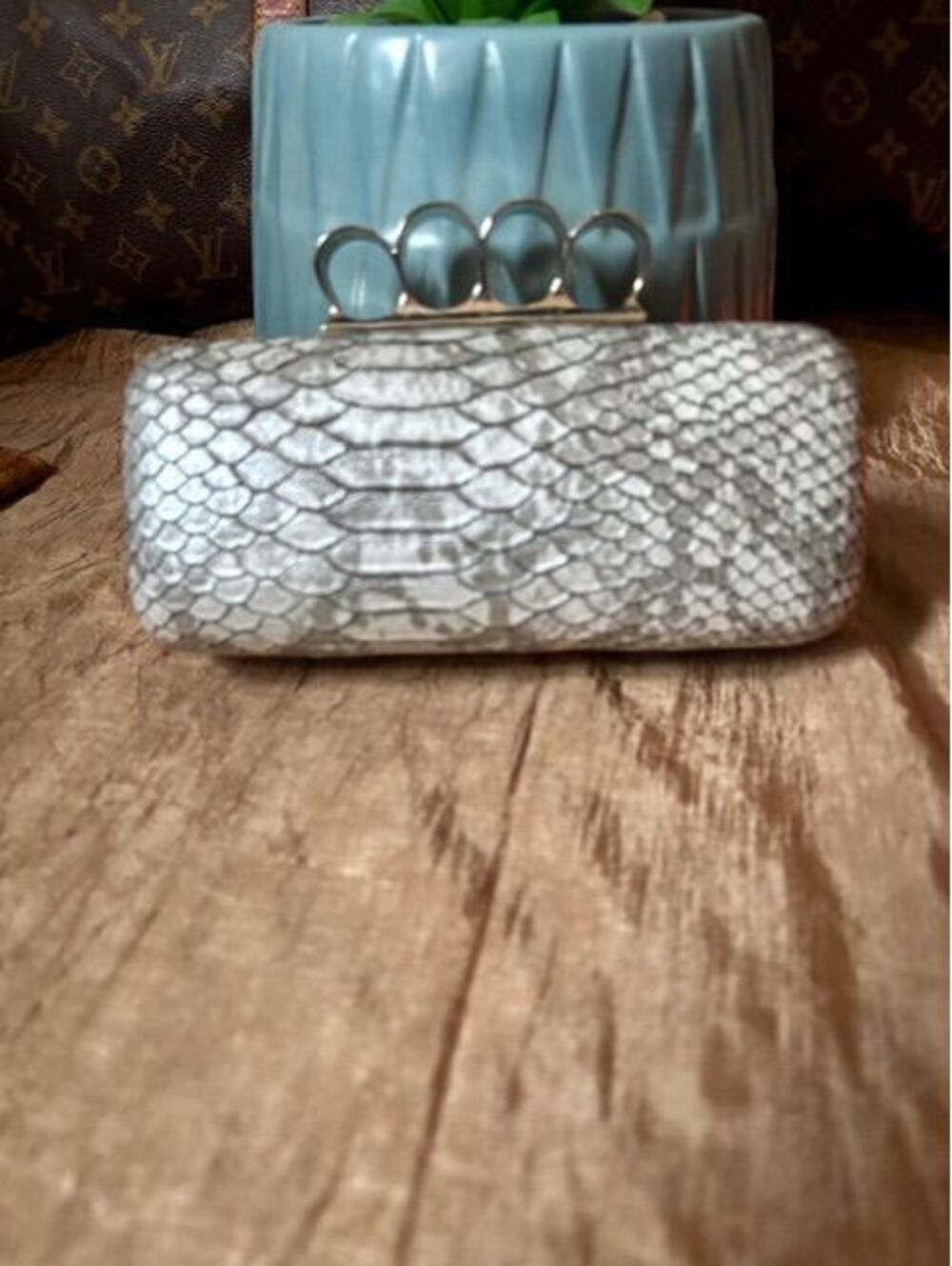 Expressions NYC Snake Print Four Finger Handle Clutch. (Gray)